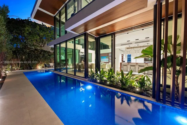 a view of swimming pool with outdoor seating