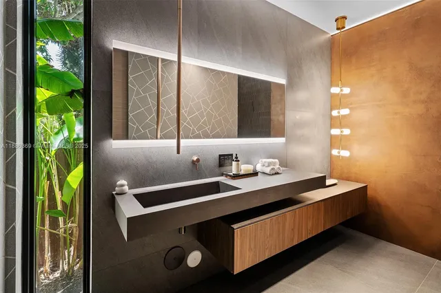 a bathroom with a tub and a sink