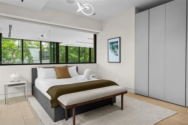 a view of a backyard with sitting area