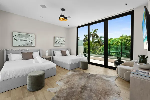 a view of a terrace with couches and city view