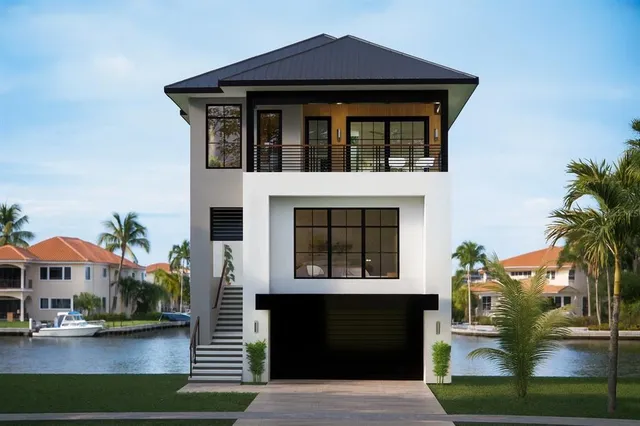 a front view of a house with garage