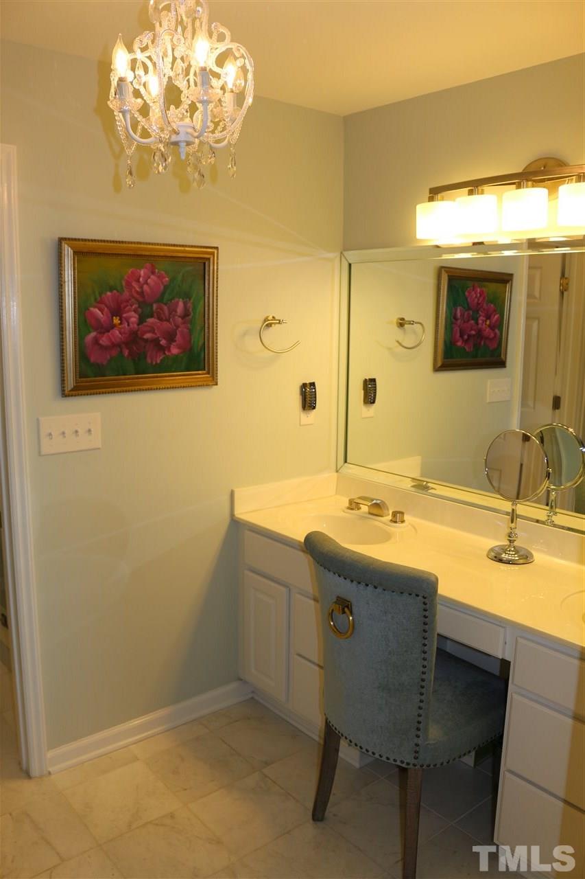 520 Springfork Drive, Unit 520 Cary, NC 27513 - Photo 21 of 25 Double Sink in Master Bedroom with Marble Flooring