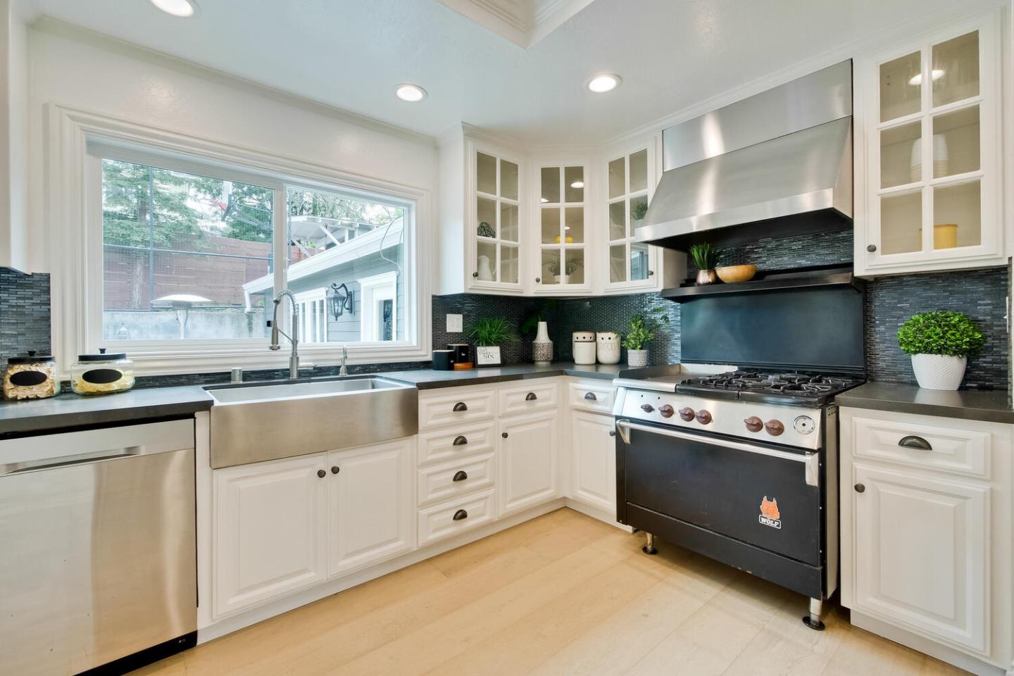 105 Terrace Road Walnut Creek, CA 94597 - Photo 18 of 47 a kitchen with stainless steel appliances granite countertop a stove and cabinets