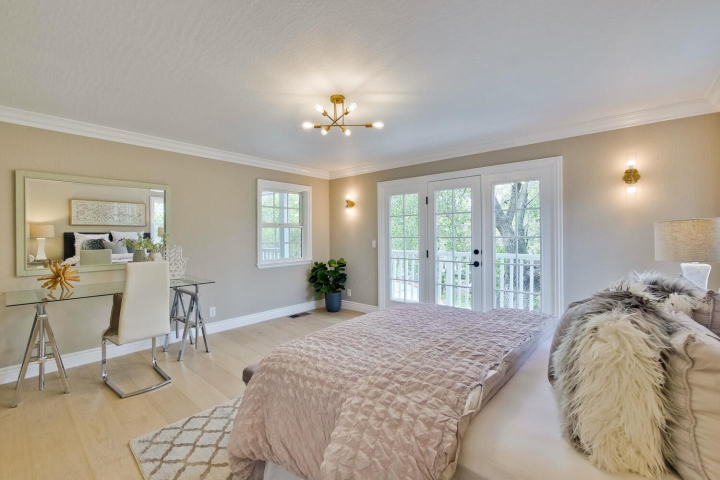 105 Terrace Road Walnut Creek, CA 94597 - Photo 34 of 47 a spacious bedroom with a large bed and a chandelier