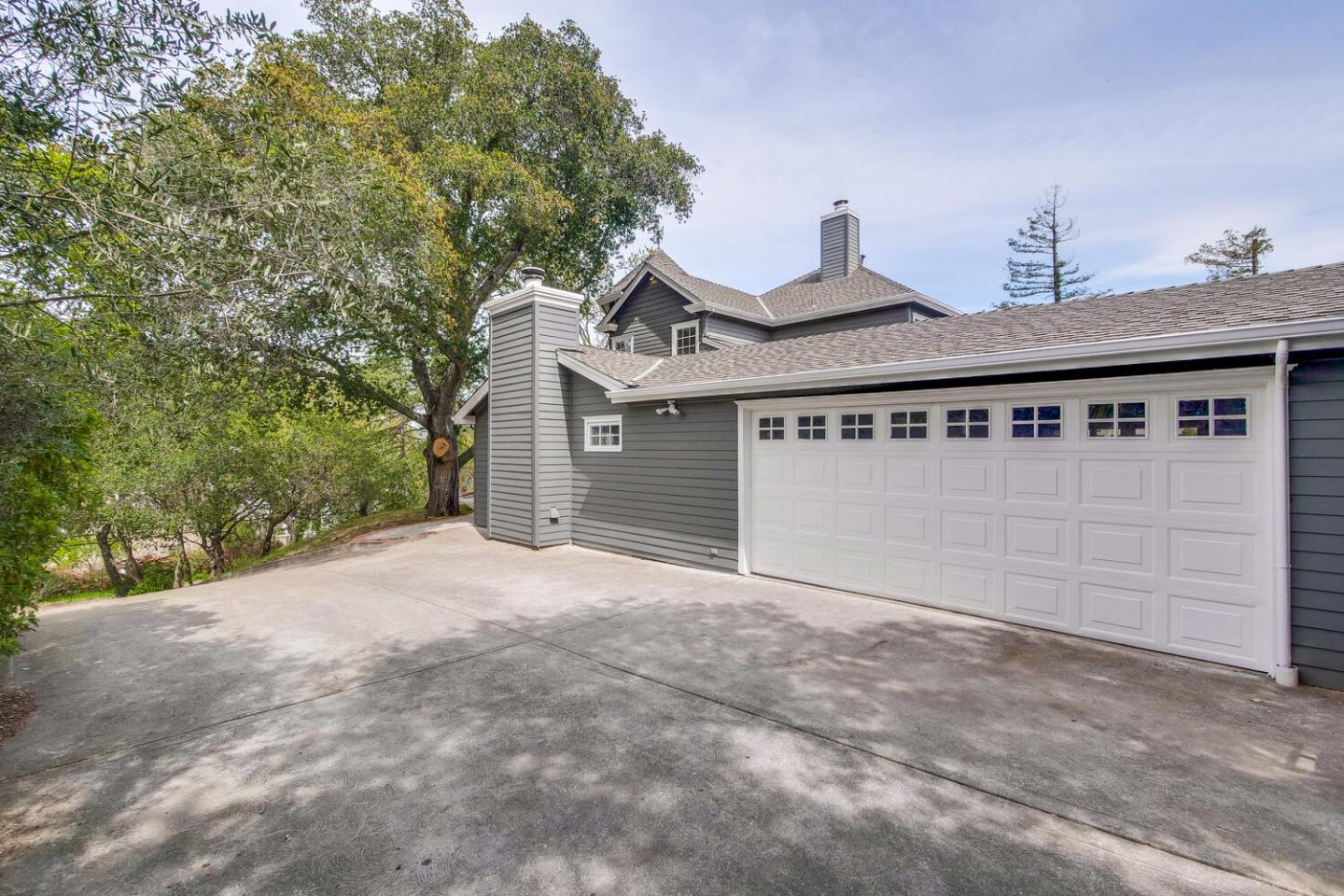 105 Terrace Road Walnut Creek, CA 94597 - Photo 7 of 47 a view of a house with a garage and yard