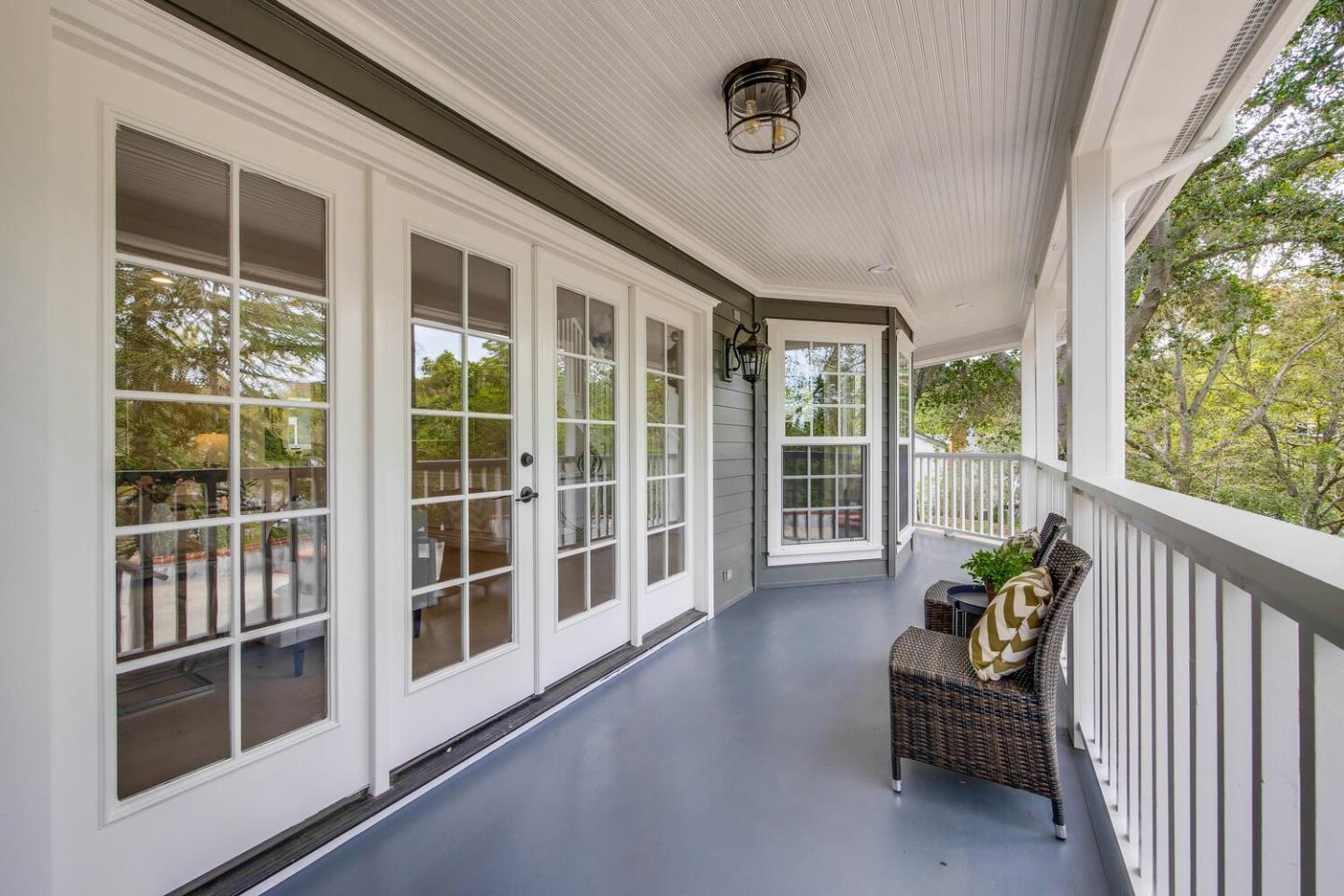 105 Terrace Road Walnut Creek, CA 94597 - Photo 8 of 47 a view of a porch with furniture and floor to ceiling window