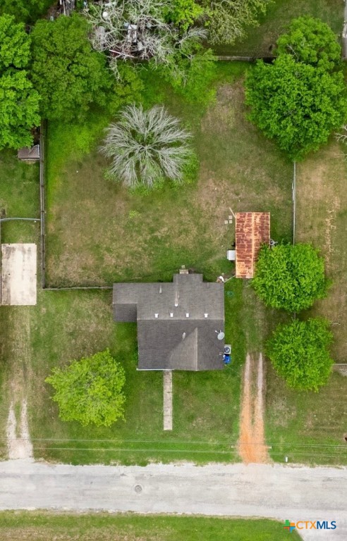 704 Maple Street Yoakum, TX 77995 - Photo 2 of 18 an aerial view of a house with a yard
