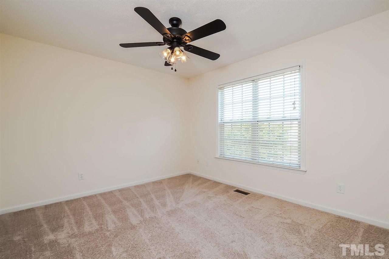 7120 Missionary Ridge Drive Raleigh, NC 27610 - Photo 22 of 25 a view of an empty room with a window