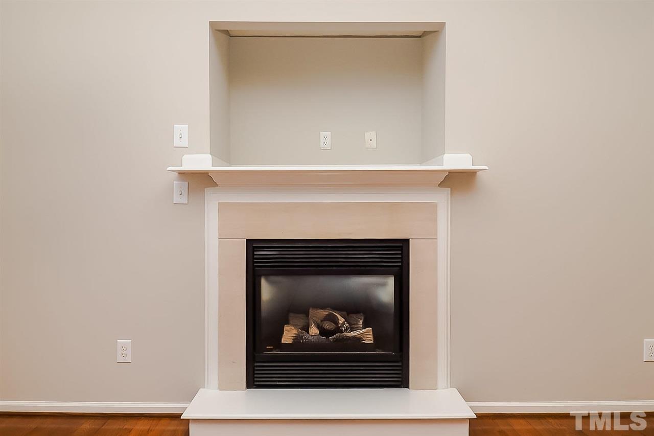 7120 Missionary Ridge Drive Raleigh, NC 27610 - Photo 8 of 25 a living room with a fireplace