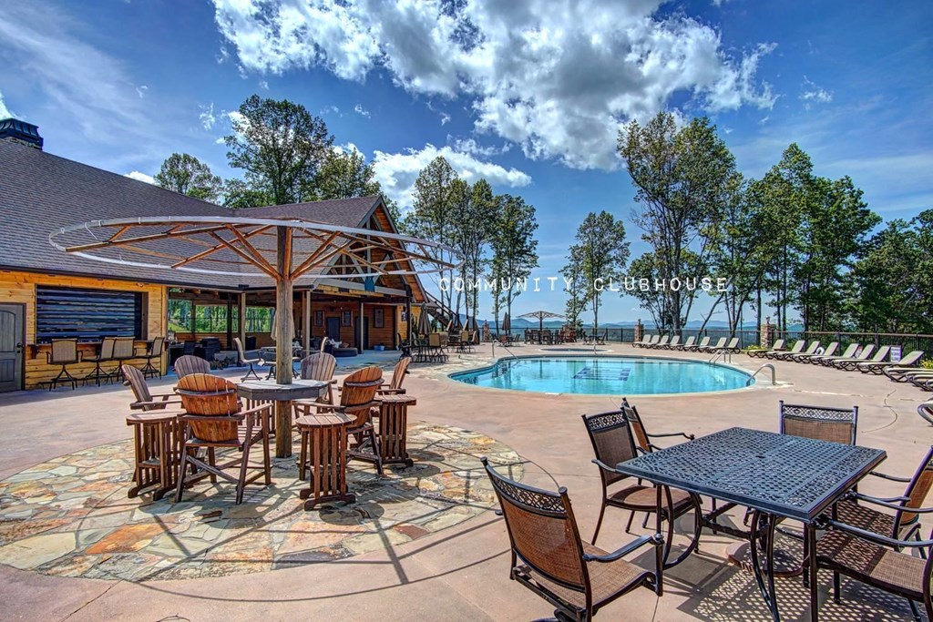 161 Loop Lane Blairsville, GA 30512 - Photo 65 of 67 a view of a swimming pool with sitting area