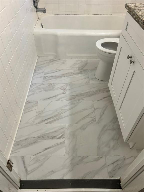 2267 Rugby Terrace Atlanta, GA 30337 - Photo 12 of 19 a bathroom with a sink and toilet