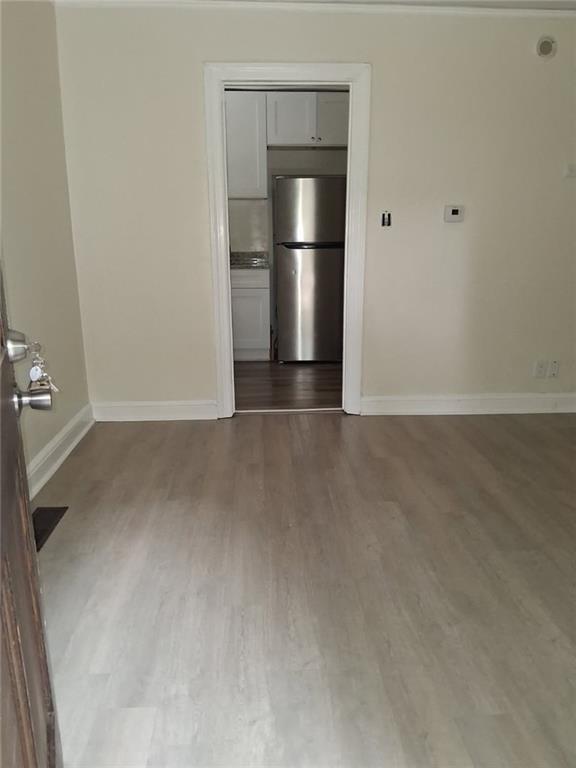 2267 Rugby Terrace Atlanta, GA 30337 - Photo 13 of 19 a view of a kitchen with a sink and refrigerator