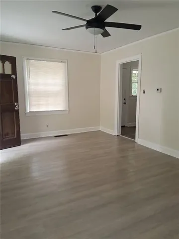 a kitchen with stainless steel appliances granite countertop a refrigerator sink and cabinets