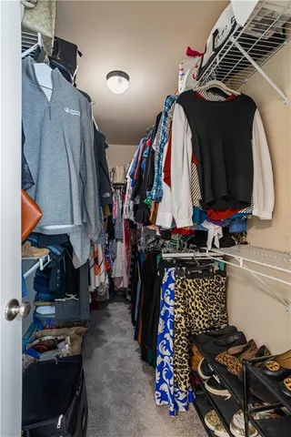 a bathroom with a double vanity sink toilet and a mirror