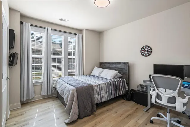 a kitchen with stainless steel appliances granite countertop a refrigerator stove microwave and sink