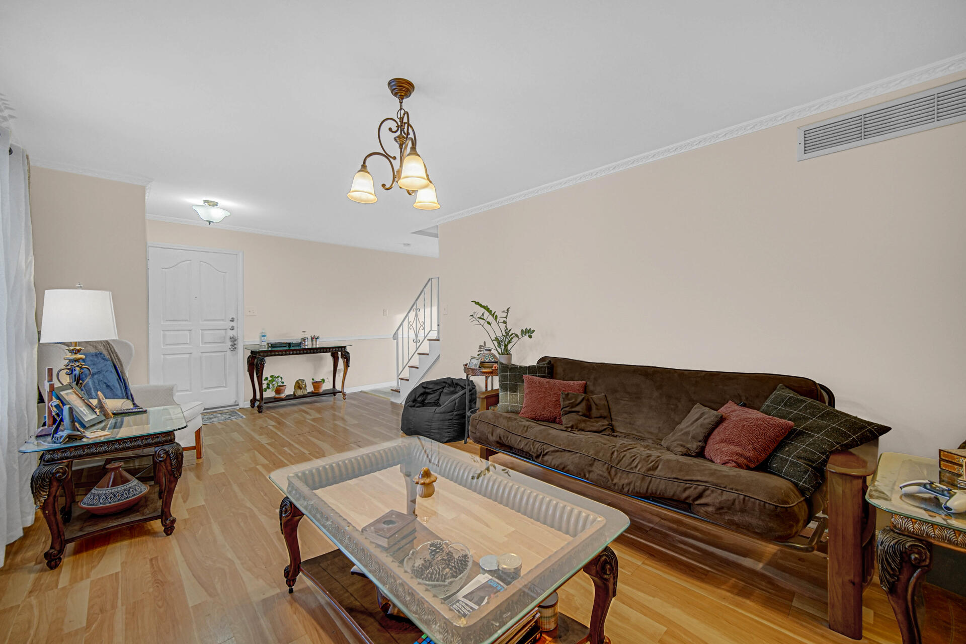 7933 Jefferson Avenue, Unit 4B Munster, IN 46321 - Photo 4 of 20 a living room with furniture and a wooden floor