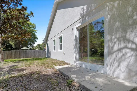 a view of a back yard of the house