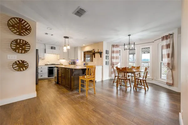 a living room with furniture and a table