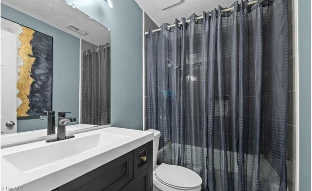 $305,000 | 202 Hassellwood Drive, Jamestown, NC 27282