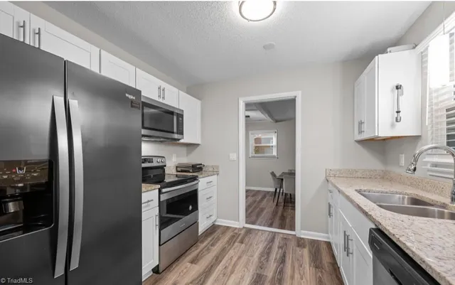 $305,000 | 202 Hassellwood Drive, Jamestown, NC 27282