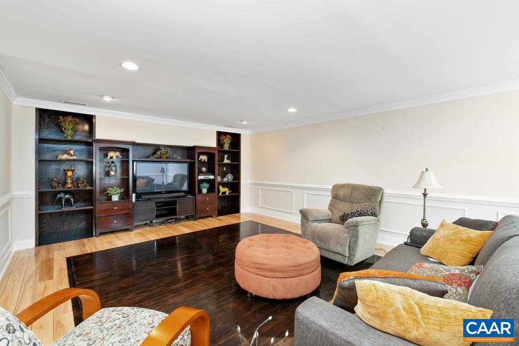 2765 Gelletly Road Charlottesville, VA 22902 - Photo 14 of 42 a living room with furniture and a flat screen tv