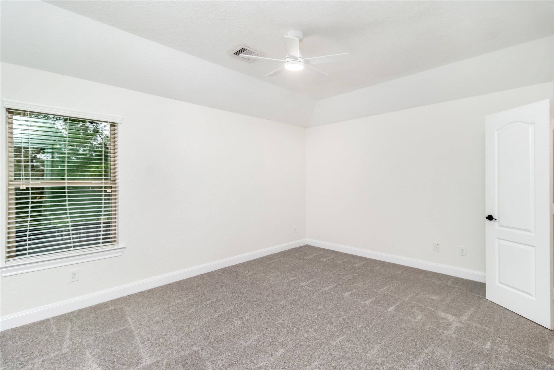 142 Pinto Point Place Spring, TX 77389 - Photo 24 of 36 a view of a room that has a window in it