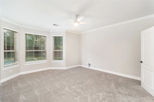 a view of a house with pool and a yard