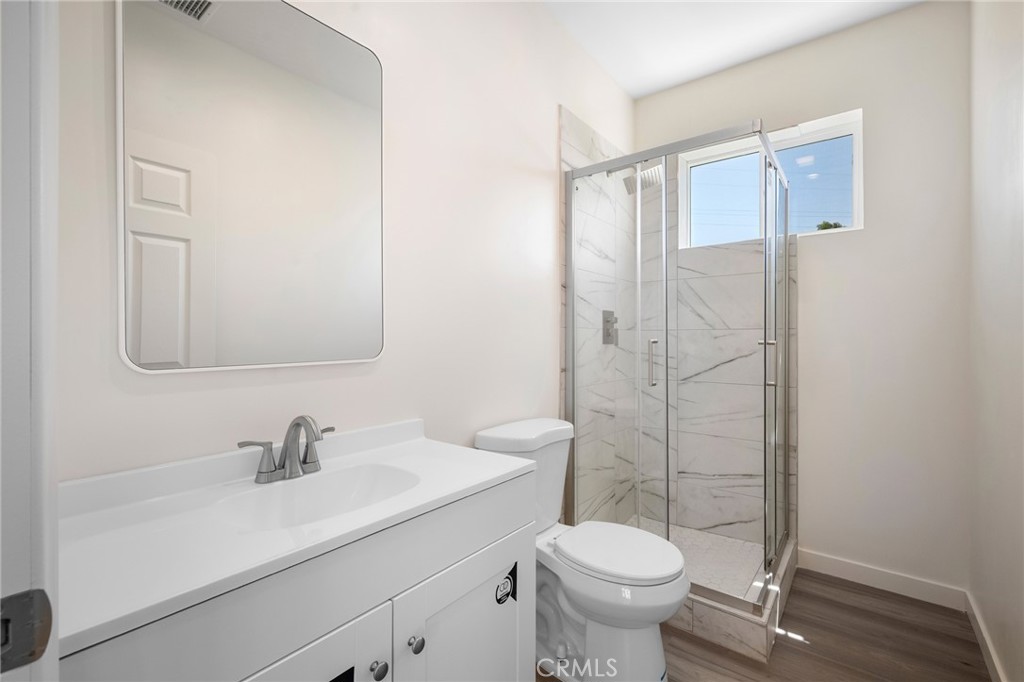 8435 Rincon Avenue Sun Valley, CA 91352 - Photo 45 of 61 a bathroom with a sink toilet and shower