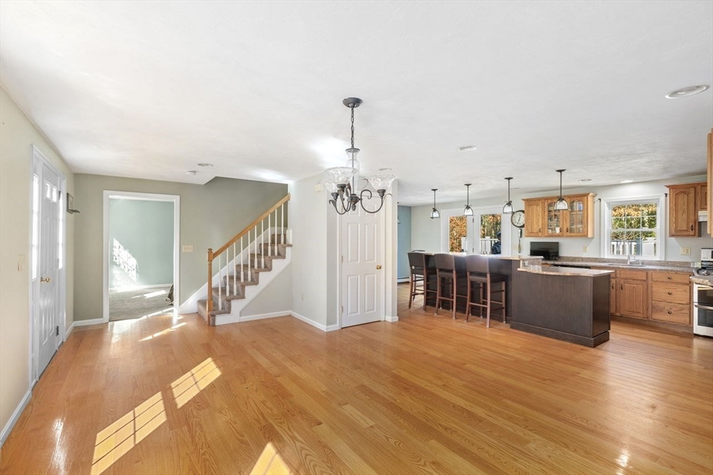 102 Haskell Ridge Road Rochester, MA 02770 - Photo 12 of 36 a room with furniture and a kitchen