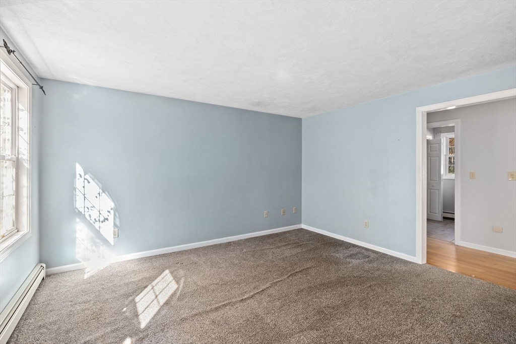 102 Haskell Ridge Road Rochester, MA 02770 - Photo 18 of 36 an empty room with windows