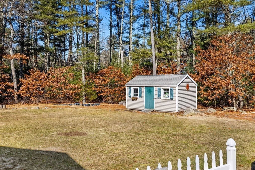 102 Haskell Ridge Road Rochester, MA 02770 - Photo 30 of 36 a view of a house with a yard