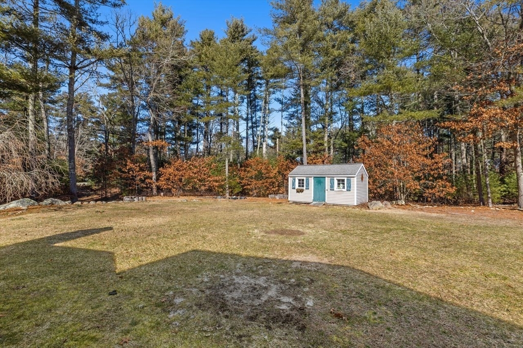 102 Haskell Ridge Road Rochester, MA 02770 - Photo 33 of 36 a view of a house with a yard