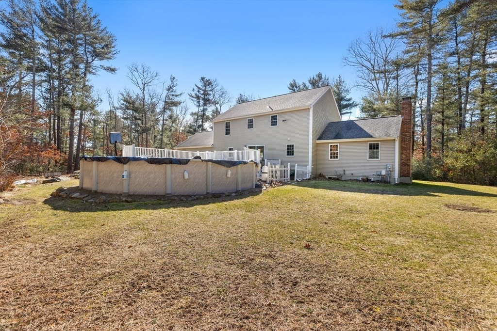 102 Haskell Ridge Road Rochester, MA 02770 - Photo 36 of 36 a view of a house with a yard