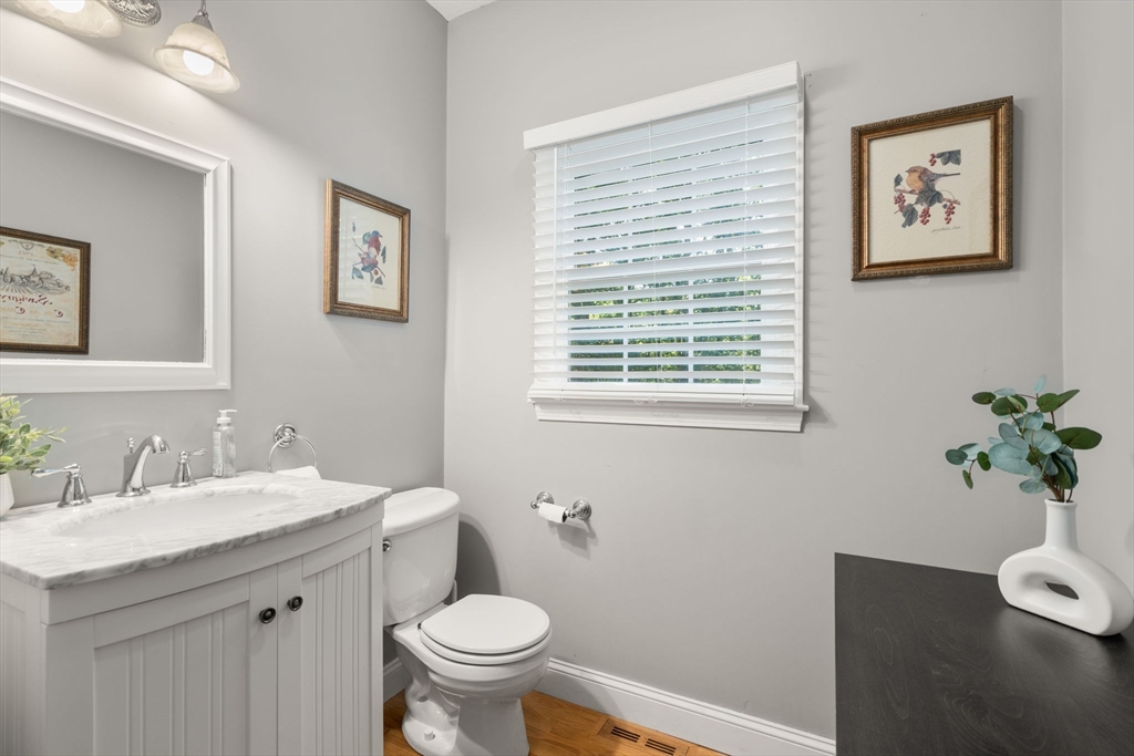 15 Broad Acres Farm Road Medway, MA 02053 - Photo 17 of 42 a bathroom with a toilet sink and mirror