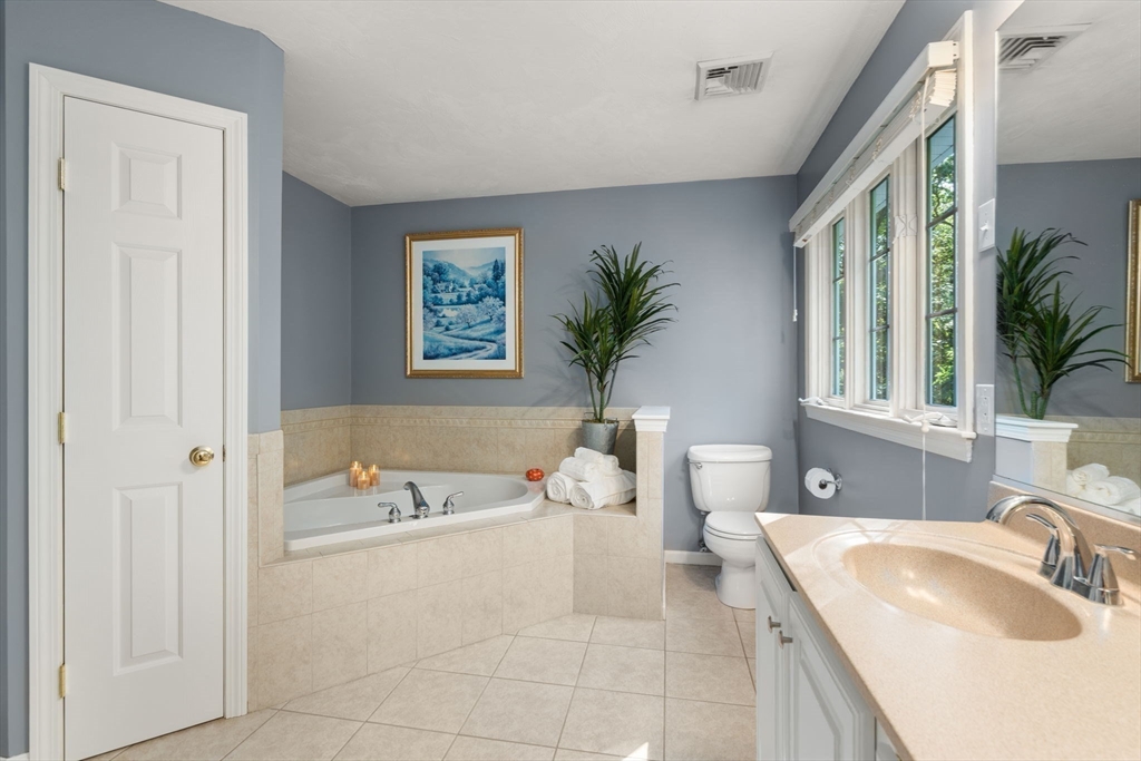 15 Broad Acres Farm Road Medway, MA 02053 - Photo 23 of 42 a spacious bathroom with a tub sink and mirror