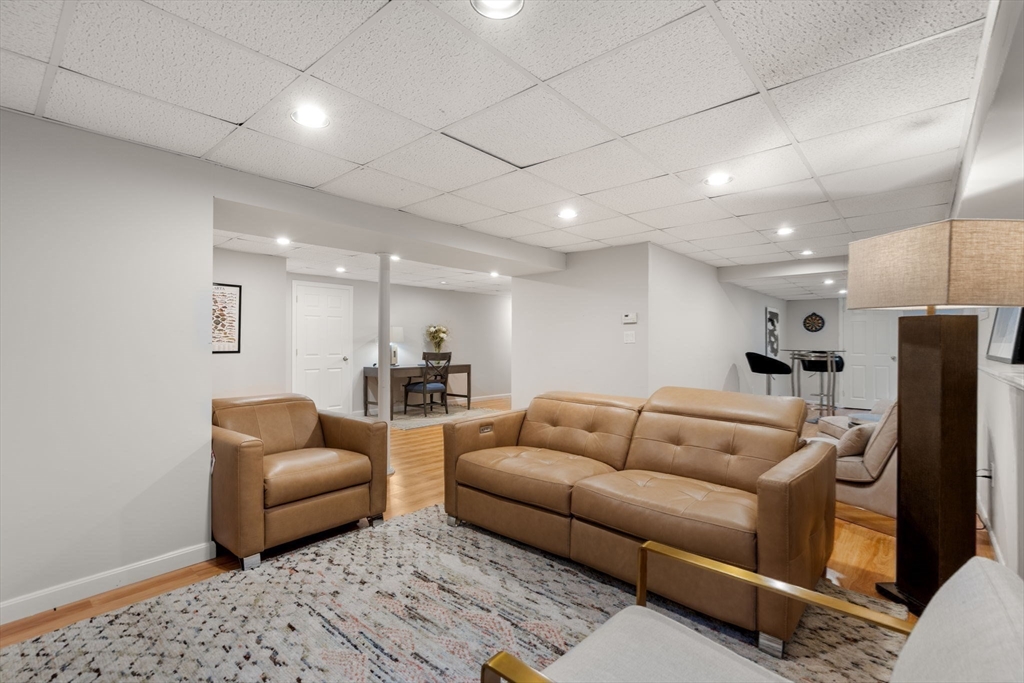 15 Broad Acres Farm Road Medway, MA 02053 - Photo 32 of 42 a living room with furniture and a couch