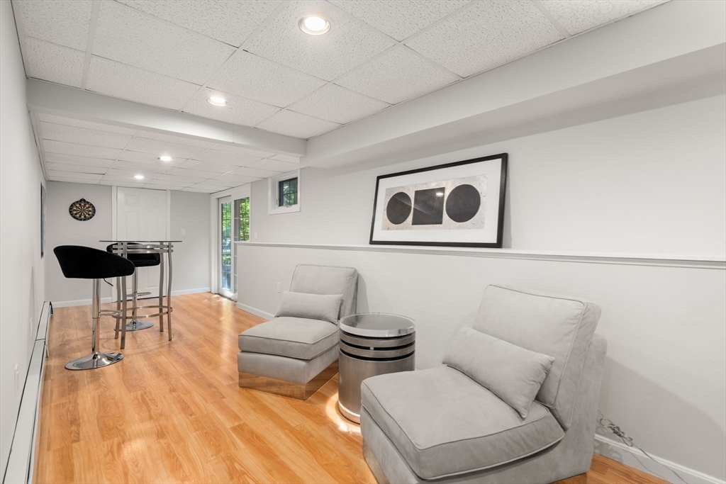 15 Broad Acres Farm Road Medway, MA 02053 - Photo 33 of 42 a living room with furniture and a rug