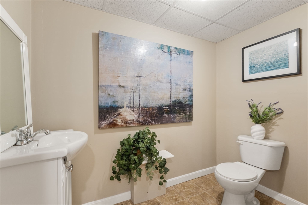 15 Broad Acres Farm Road Medway, MA 02053 - Photo 34 of 42 a bathroom with a toilet sink and mirror