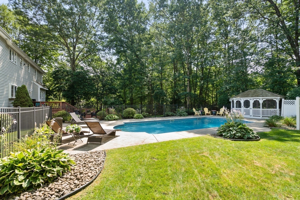 15 Broad Acres Farm Road Medway, MA 02053 - Photo 37 of 42 a view of a swimming pool with a patio