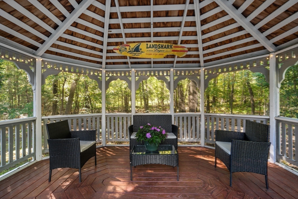 15 Broad Acres Farm Road Medway, MA 02053 - Photo 39 of 42 a view of a chairs and a table in the balcony