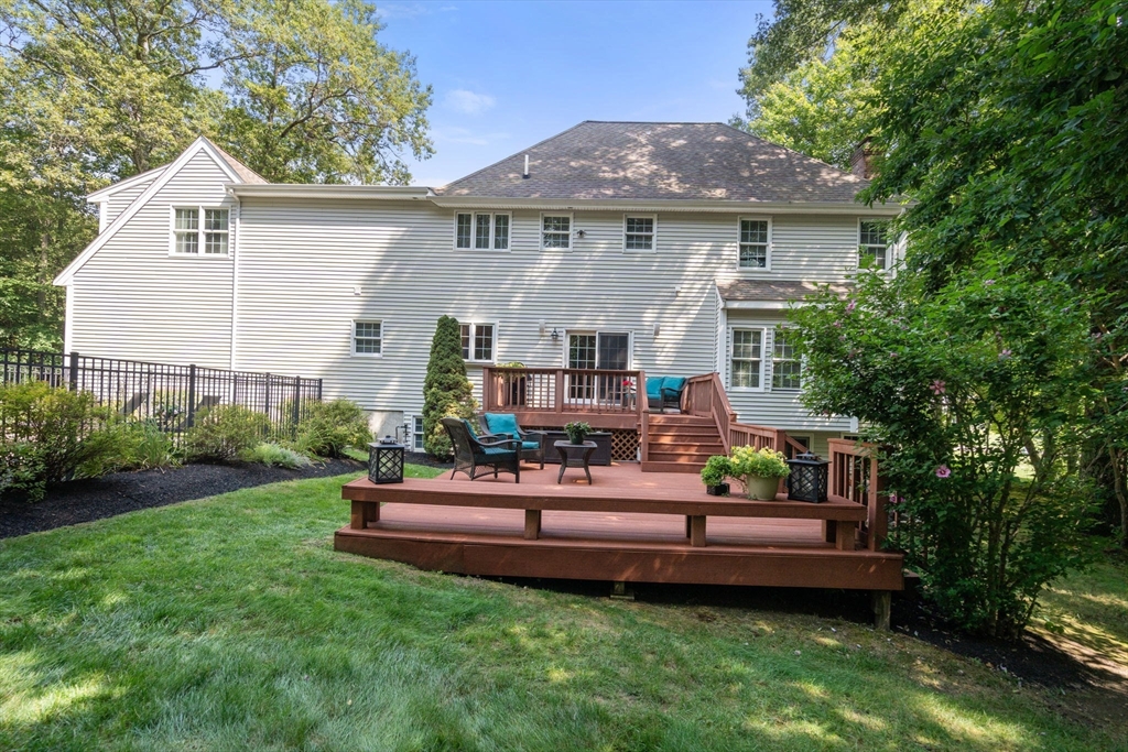 15 Broad Acres Farm Road Medway, MA 02053 - Photo 40 of 42 a view of a house with backyard sitting area and garden