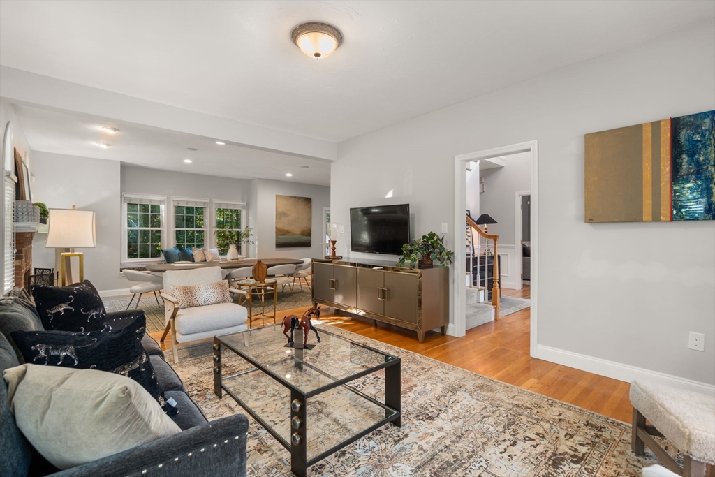 15 Broad Acres Farm Road Medway, MA 02053 - Photo 4 of 42 a living room with furniture and a flat screen tv