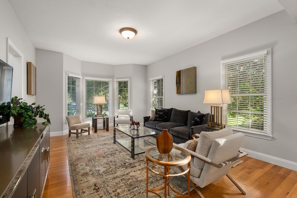 15 Broad Acres Farm Road Medway, MA 02053 - Photo 5 of 42 a living room with furniture and a large window