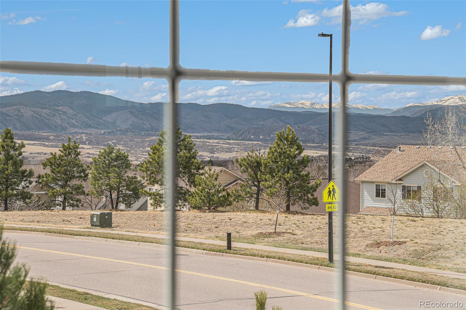 2470 Robindale Way Castle Rock, CO 80109 - Photo 18 of 42 a view of a street from a balcony