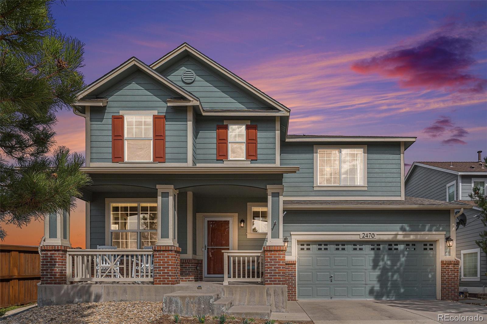 2470 Robindale Way Castle Rock, CO 80109 - Photo 37 of 42 a front view of a house with yard