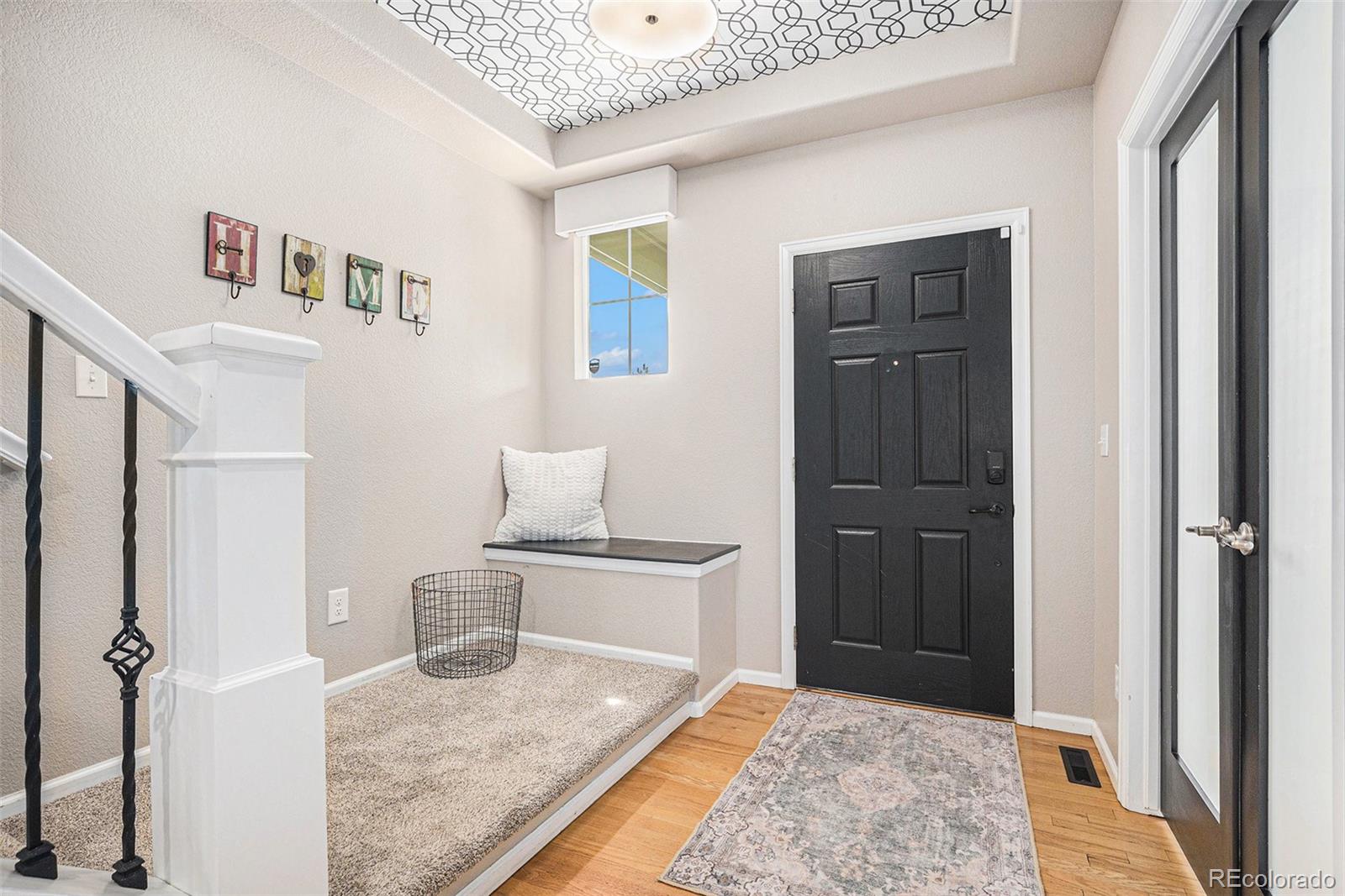 2470 Robindale Way Castle Rock, CO 80109 - Photo 4 of 42 a en suite bathroom with a granite countertop sink and a mirror
