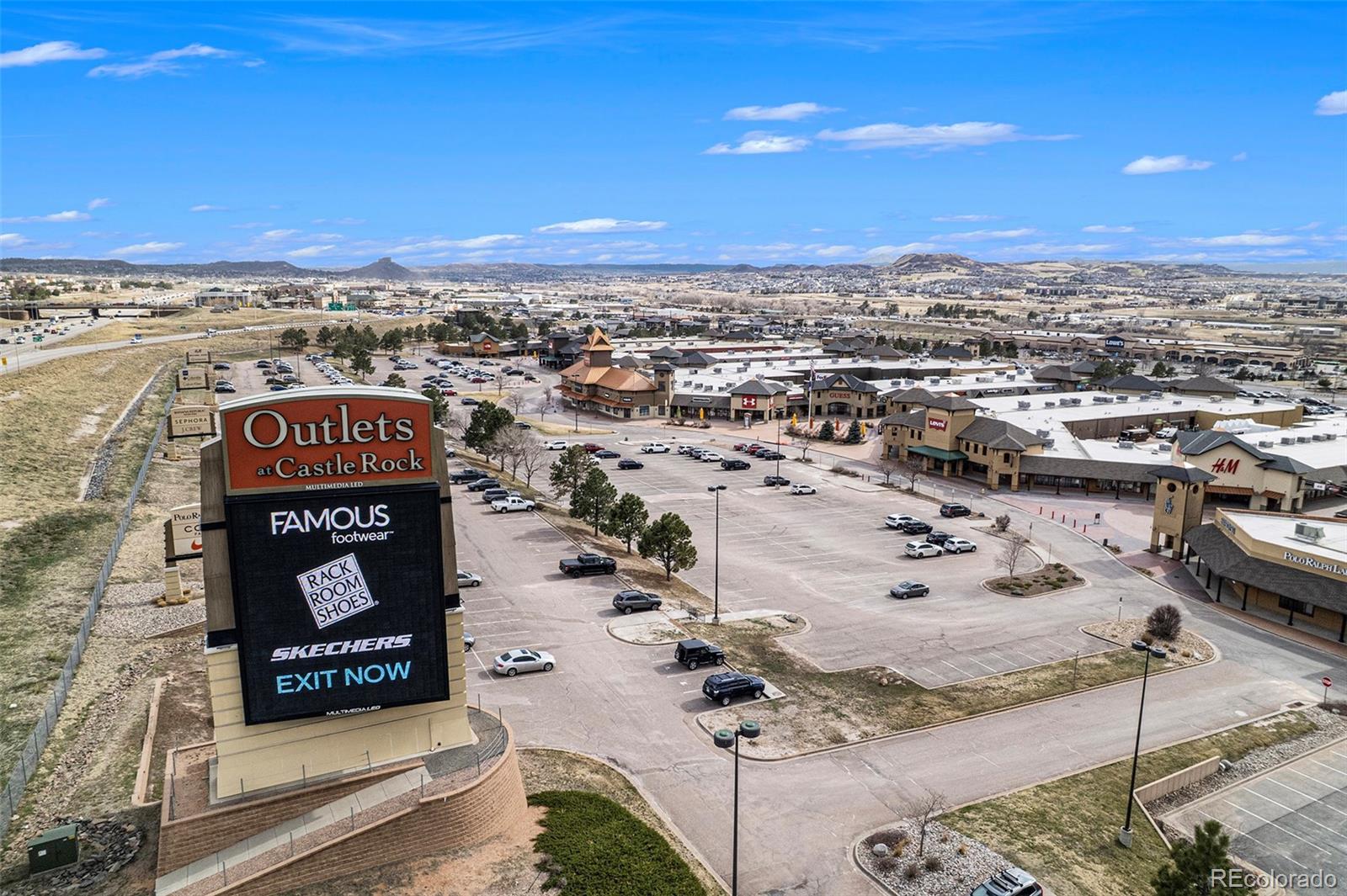 2470 Robindale Way Castle Rock, CO 80109 - Photo 42 of 42 a view of a sign board with city view