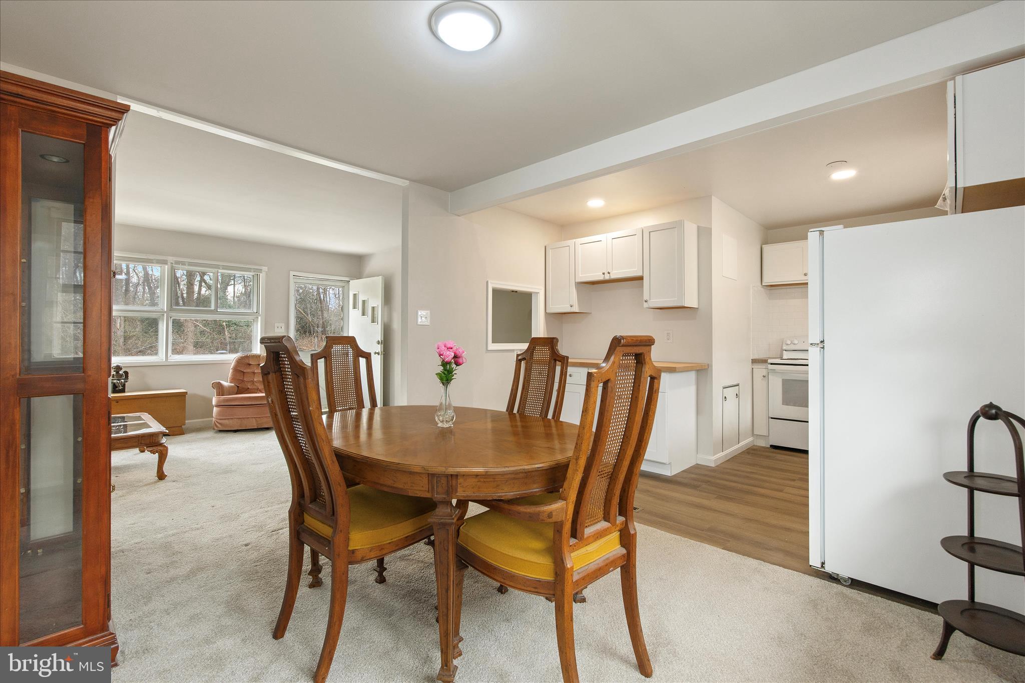 802 Lucky Road Severn, MD 21144 - Photo 11 of 32 a view of a dining room with furniture and wooden floor