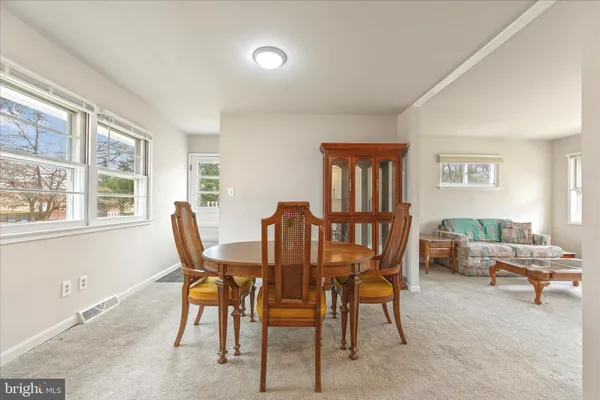 a view of a livingroom and dining room