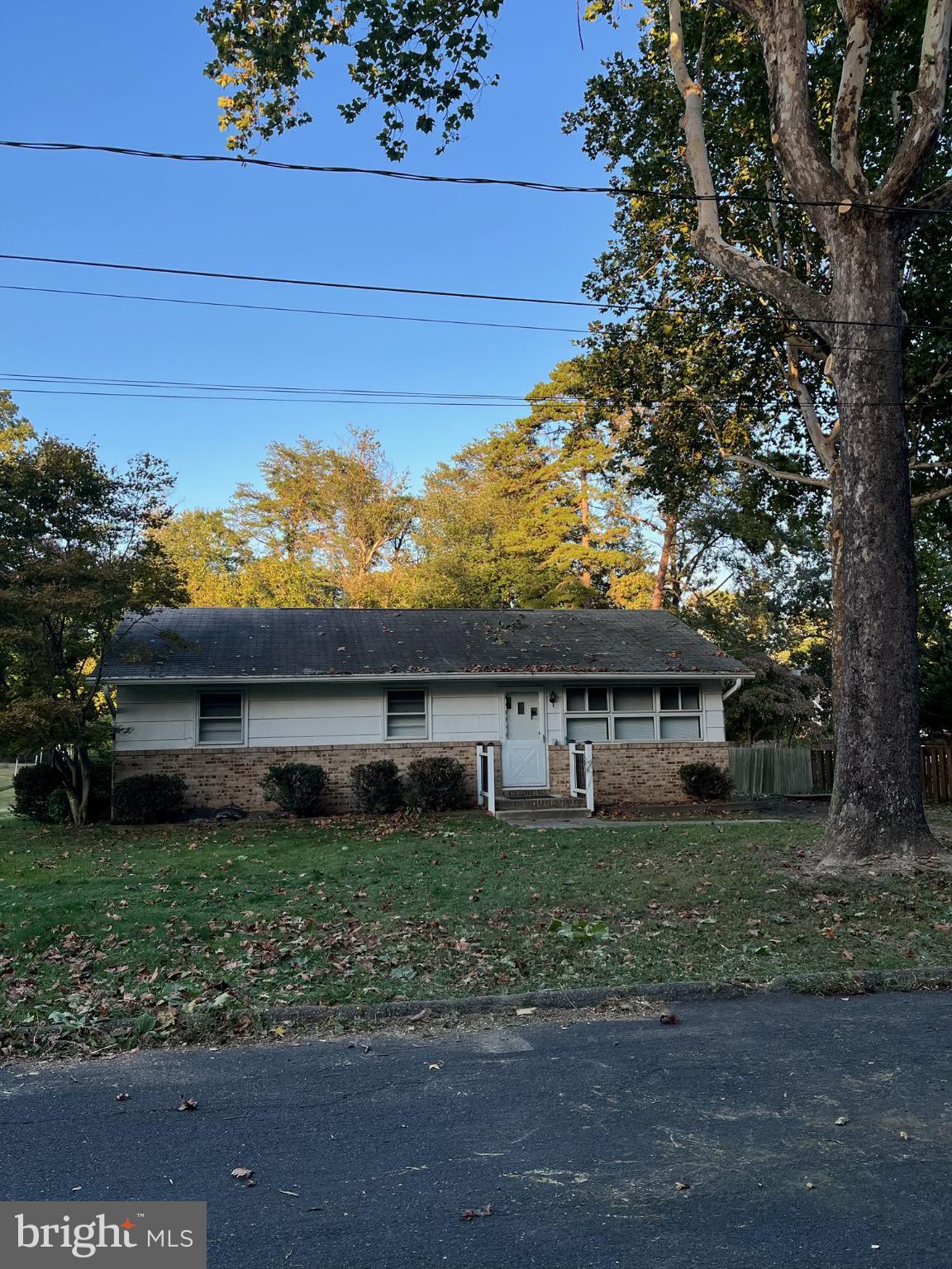802 Lucky Road Severn, MD 21144 - Photo 2 of 32 a front view of a house with a yard